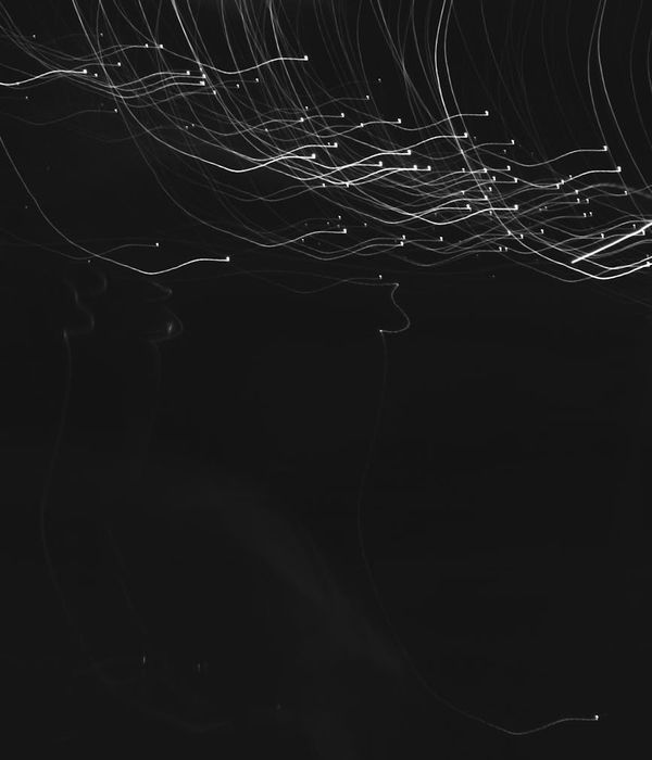 Abstract glowing light patterns representing dynamic movement